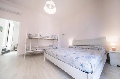Letto o letti in una camera di Gli appartamenti della Fra