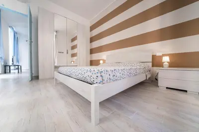 Letto o letti in una camera di Gli appartamenti della Fra