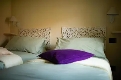 Letto o letti in una camera di Casina Matilde