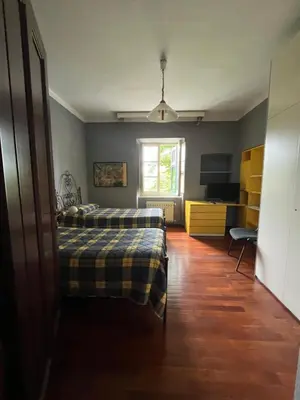 Letto o letti in una camera di I POGGI DI S.CATERINA