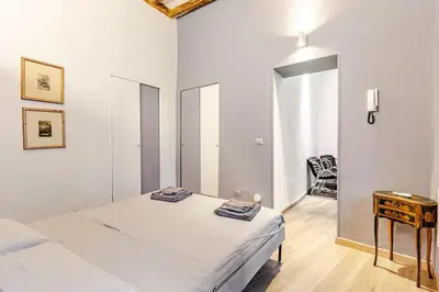Letto o letti in una camera di Appartamento il Borgo
