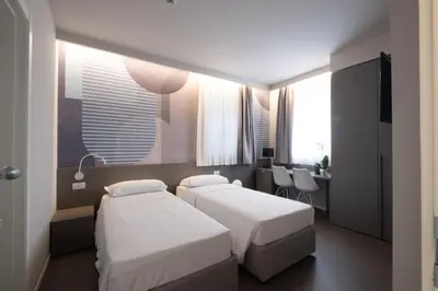 Letto o letti in una camera di Zeta T Rooms