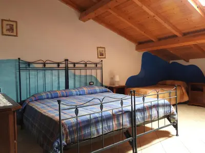 Letto o letti in una camera di Affittacamere 