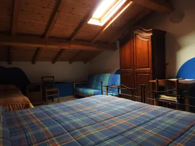 Letto o letti in una camera di Affittacamere 