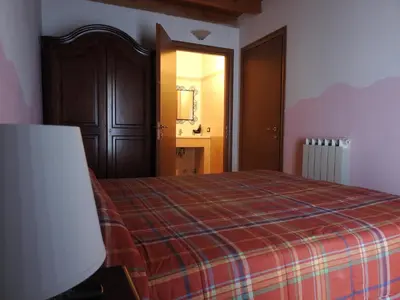 Letto o letti in una camera di Affittacamere 