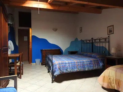 Letto o letti in una camera di Affittacamere 