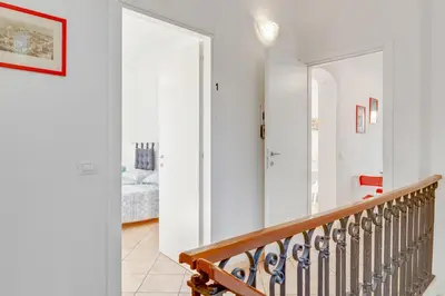 Letto o letti in una camera di GuestHost - La Spezia Migliarina Apartment con terrazzo