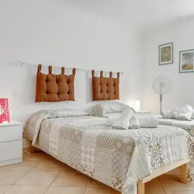 GuestHost - La Spezia Migliarina Bedrooms