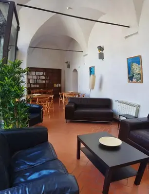 Area soggiorno di Ospitalia del Mare Hostel