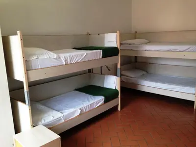 Letto o letti in una camera di Ospitalia del Mare Hostel