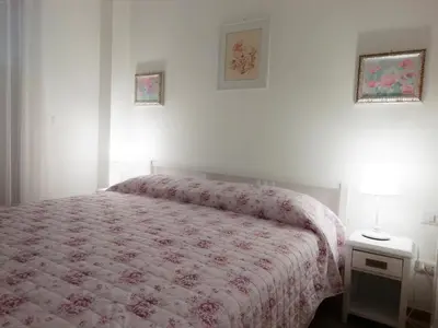 Letto o letti in una camera di La Vie En Rose
