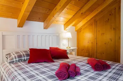 Letto o letti in una camera di Mansarda Villa Adele