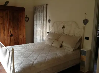 Letto o letti in una camera di CASA DELLA LUCE private pool