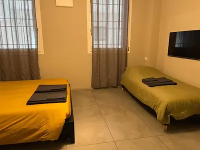 Letto o letti in una camera di La Casa all'ombra della Chiesa