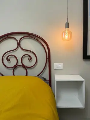Letto o letti in una camera di La Casa all'ombra della Chiesa