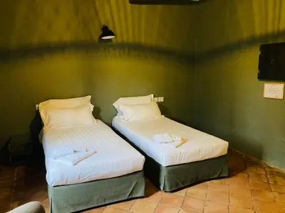 Letto o letti in una camera di La Locanda di Grazzano Visconti