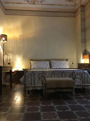 Letto o letti in una camera di Portale dei Soli - Room & Breakfast