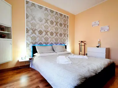 Letto o letti in una camera di GUEST HOLIDAY GRAMSCI