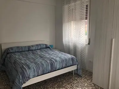 Letto o letti in una camera di Bandello Apartment - A due passi dal centro