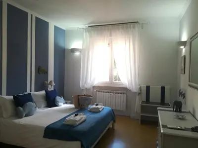 Letto o letti in una camera di casa enrica