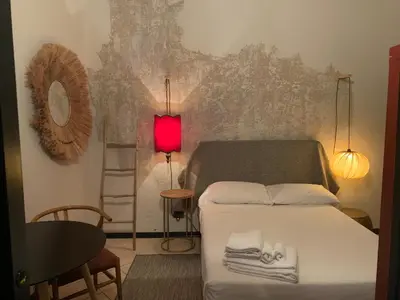 Letto o letti in una camera di Mood-Garibaldi