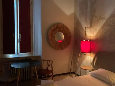 Letto o letti in una camera di Mood-Garibaldi