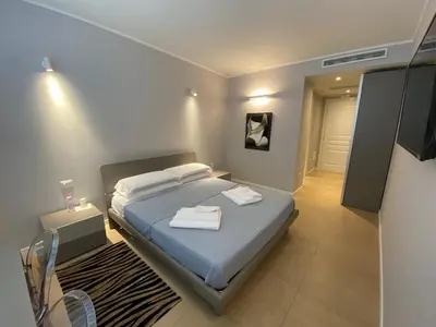 Letto o letti in una camera di Golgi Suite
