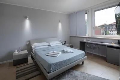 Letto o letti in una camera di Golgi Suite