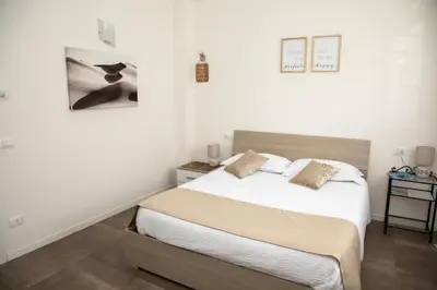 Letto o letti in una camera di Maisonette Modena Park