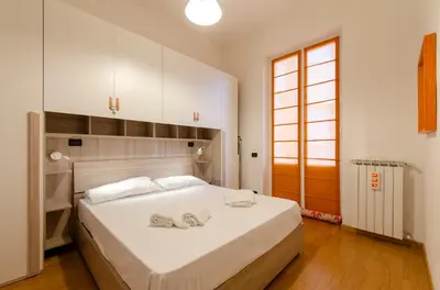 Letto o letti in una camera di JOIVY Apt for 4, metres from beach, in Sestri Levante