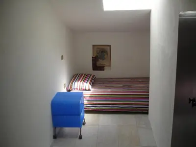 Letto o letti in una camera di Holiday House La Colombaia