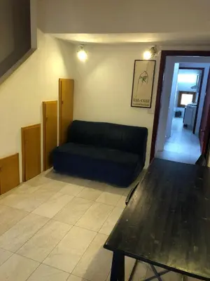 Area soggiorno di Holiday House La Colombaia
