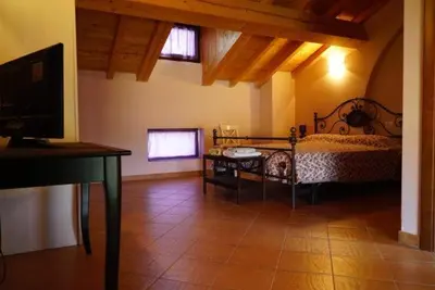 Letto o letti in una camera di La Cascina del Sole