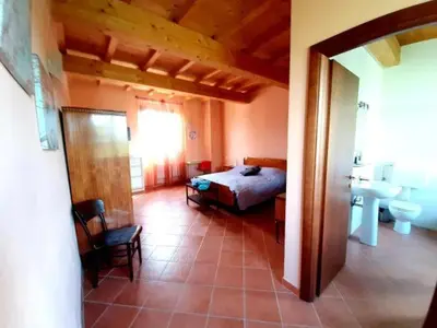 Letto o letti in una camera di La Cascina del Sole