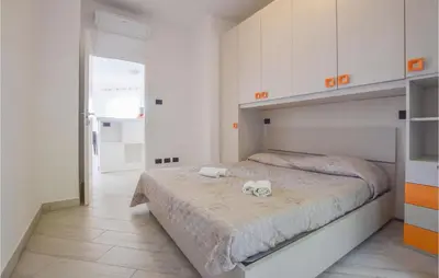 Letto o letti in una camera di 2 Bedroom Cozy Apartment In Moneglia