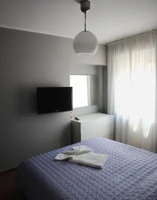 Letto o letti in una camera di Casa Jomi b&b Borghetto Lodigiano