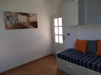 Letto o letti in una camera di AGRITURISMO TERRE VERAE