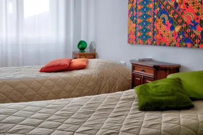 Letto o letti in una camera di La Casa di Nilde