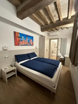 Letto o letti in una camera di Residenza Pezzani