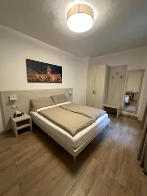 Letto o letti in una camera di Residenza Pezzani