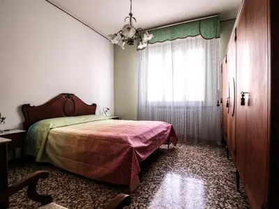 Letto o letti in una camera di Residenza Parco Ducale 2