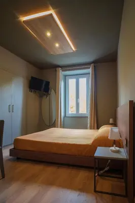 Letto o letti in una camera di Albergo Ristorante Plaza
