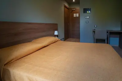 Letto o letti in una camera di Albergo Ristorante Plaza