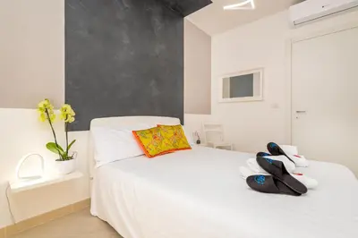 Letto o letti in una camera di Appartamento Ercole
