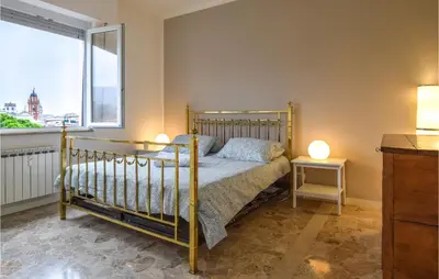 Letto o letti in una camera di 2 Bedroom Lovely Apartment In Chiavari