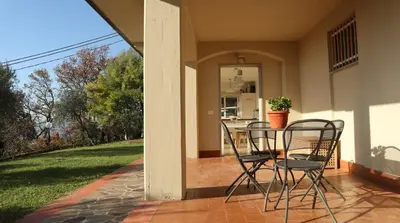 Patio o area all'aperto di Il Porredo - seaview cottage with garden, terrace and patio - Fosdinovo