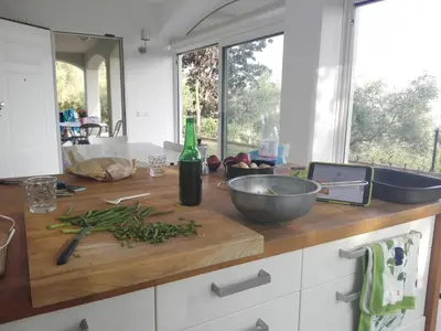 Cucina o angolo cottura di Il Porredo - seaview cottage with garden, terrace and patio - Fosdinovo