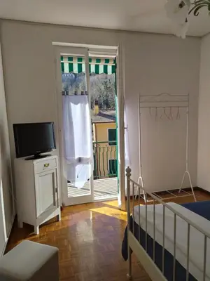 Letto o letti in una camera di Casa Iris