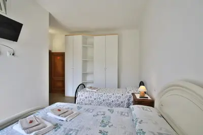 Letto o letti in una camera di Appartamento sole&mare