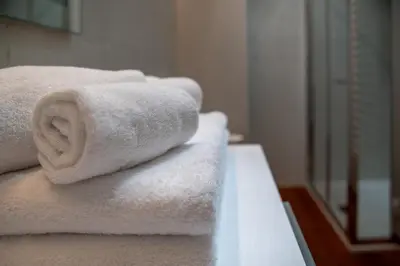 Letto o letti in una camera di Grand Hotel Torre Fara